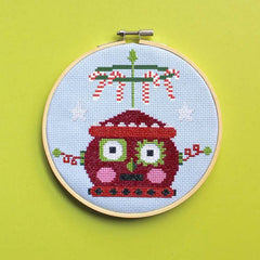 Red Christmas bot By Mary Engelbreit Counted Cross Stitch Kit From Spot Colors